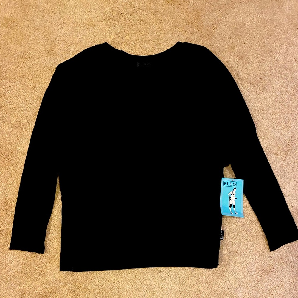 FLEO Long sleeve undefeated top.  New with tags